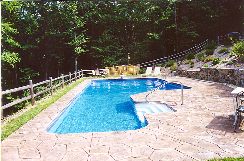 Swimming pool and stamped concrete project example 211